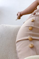 Bandážová midi sukňa so zlatými gombíkmi béžová M 19