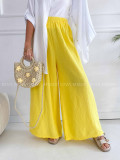 Mušelínové bavlnené nohavice wide leg žlté K 336