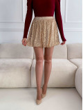 Flitrovaná balónová krátka sukňa zlatá A 174