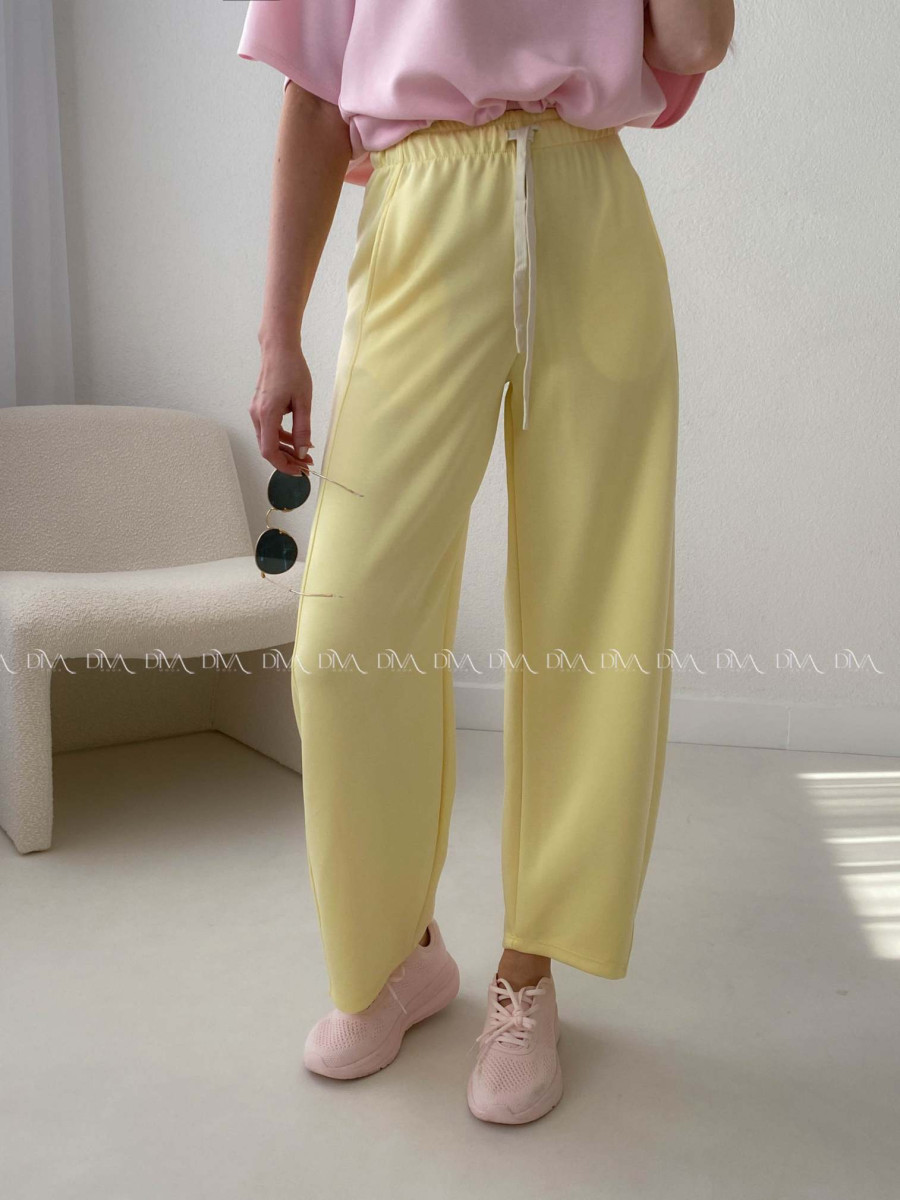 Hladké balónové tepláky žlté AB 23