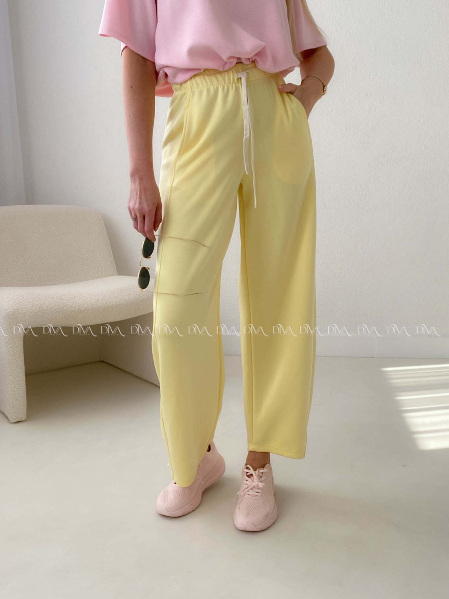 Hladké balónové tepláky žlté AB 23