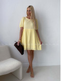 Mušelínové šaty s mašľami na chrbte žlté AB 174