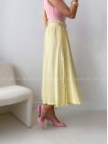 Midi mušelínová sukňa s rázporkom žltá AB 176