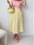 Midi mušelínová sukňa s rázporkom žltá AB 176