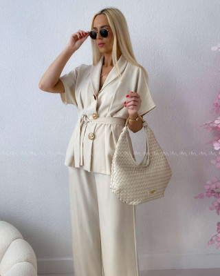 Elegantný komplet so zdobenými gombíkmi svetlo béžový AB 222